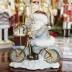 Papai Noel Decorativo Resina Bicicleta E Globo De Vidro 18Cm